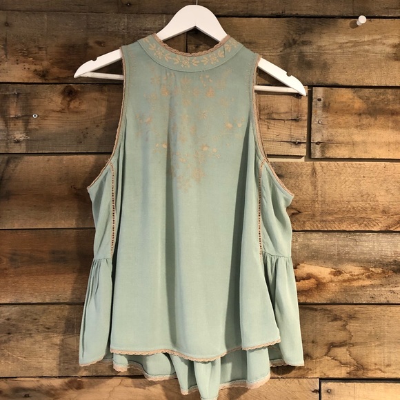 Tempted sleeveless blouse
